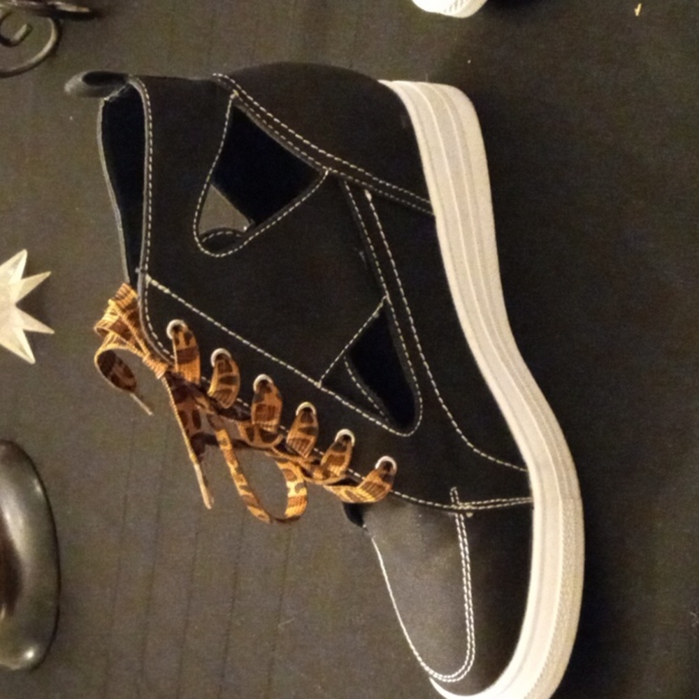 High heeled Black Shoes with animal print laces with cut outs